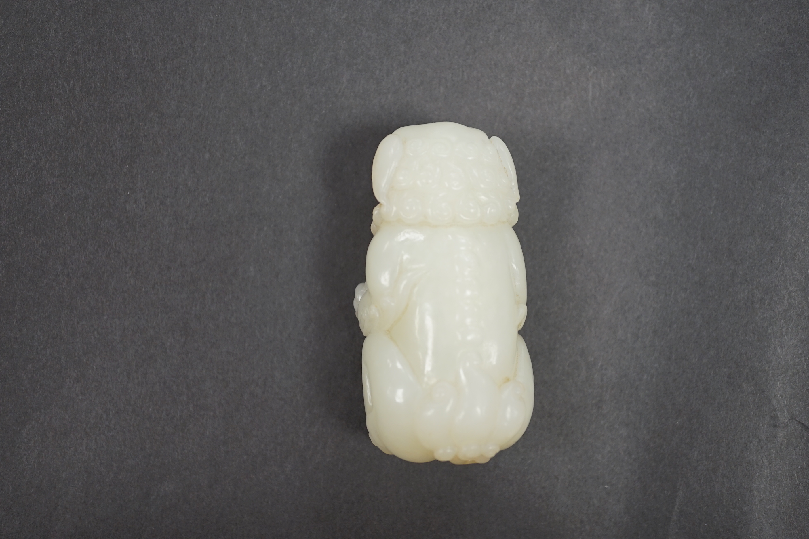 A Chinese white jade lion dog, 7cm